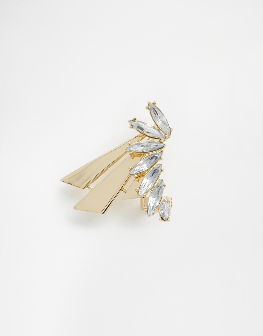 http://www.asos.de/ASOS-Ohrclip-mit-Strass-vorn-und-hinten/1920ig/?iid=5801465&cid=4175&sh=0&pge=3&pgesize=36&sort=-1&clr=Gold&totalstyles=2631&gridsize=4&mporgp=L0FTT1MvQVNPUy1DcnlzdGFsLUZyb250LWFuZC1CYWNrLUVhci1DdWZmL1Byb2Qv