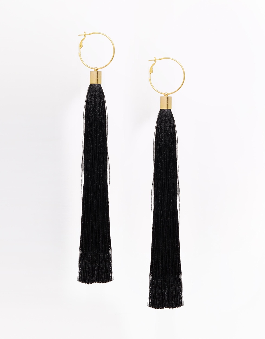 http://www.asos.de/Suzywan-DELUXE-Extralange-Quastenohrringe-in-Schwarz/190jok/?iid=5945785&cid=4175&sh=0&pge=0&pgesize=36&sort=-1&clr=Black&totalstyles=2631&gridsize=3&mporgp=L1N1enl3YW4tREVMVVhFL1N1enl3YW4tREVMVVhFLUV4dHJhLUxvbmctQmxhY2stVGFzc2VsLUVhcnJpbmdzL1Byb2Qv